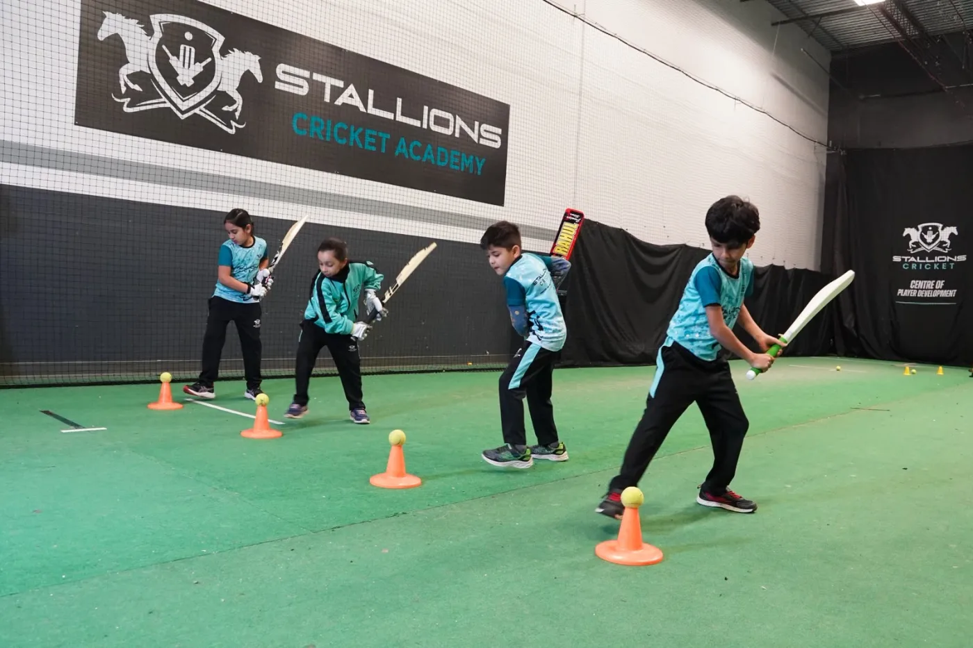Young cricketers in a group coaching session