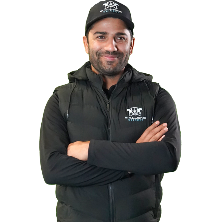 Coach Kaleem Sana - Focused young male cricket player with helmet and bat