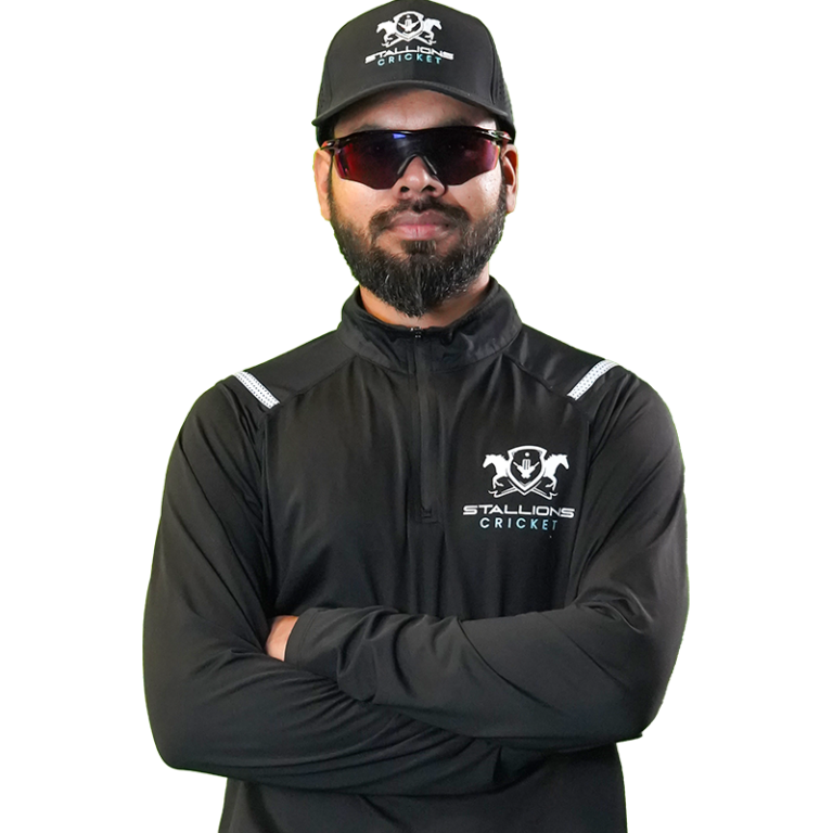Coach Sarbjeet Singh - Cricket player preparing with bat